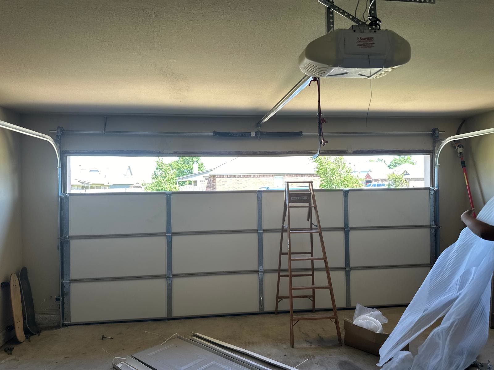New garage door and opener installed on a Tulsa home